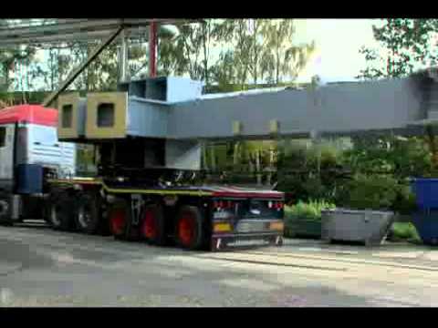 Universal Transport - Steel structure transport with new self-steering trailer by Faymonville